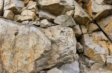 Fototapeta premium Horizontal background. Granite rock