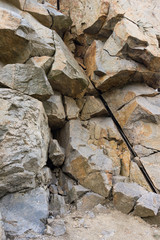 Vertical background. Granite wall. Rock