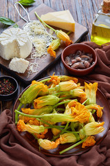 zucchini flowers prepared for stuffing, top view