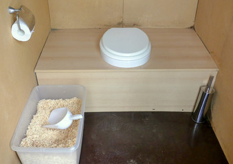 Unusual, unoccupied, recycling composting public toilet,