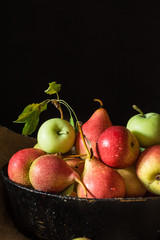 Fresh ripe organic red pears on rustic wooden table, natural background, vega, diet food. Autumn harvest. Juicy fruits on bag. Autumn mood.