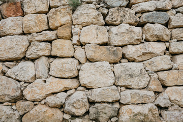 Wall of the ancient yellow sandy stones