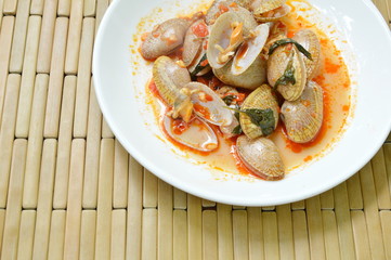 stir fried clams with roasted chili paste on plate