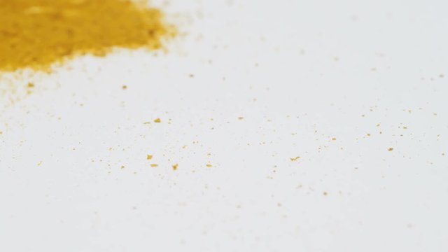 Saffron on turntable.
Video footage of rotating orange powder.