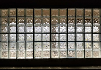 Texture background wall made of many glass cubes with black fields