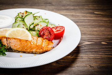 Salmon steak and vegetables
