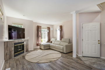 Cozy and elegant living area with fireplace.