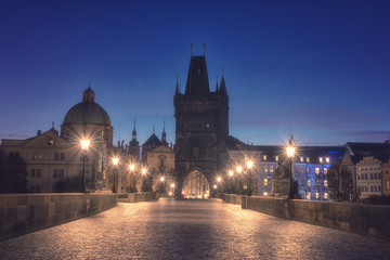 Charles bridge (Karluv most) at night, scenic view of the Old town, Prague, Czech Republic