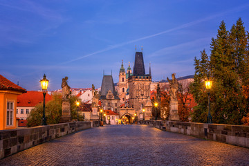 Charles bridge (Karluv most) at dawn before sunrise, scenic view of the Lesser, Prague, Czech Republic