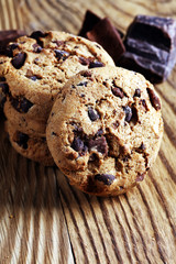 Chocolate cookies on table. Chocolate chip cookies shot with chocolate