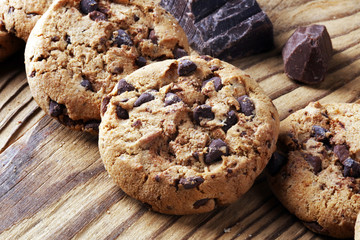 Chocolate cookies on table. Chocolate chip cookies shot with chocolate