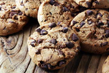 Chocolate cookies on table. Chocolate chip cookies shot with chocolate