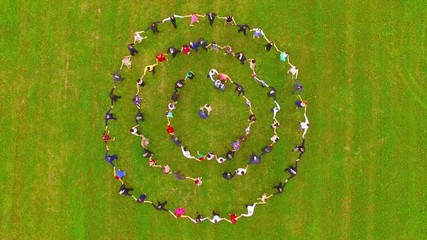 Unidentified people in Horah dance. Dancing in a circle is an ancient tradition for special occasions, rituals, strengthening community and togetherness. Traditions from above.