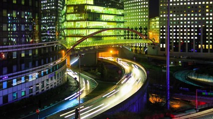 Time lapse of Paris modern buildings, dynamic urban street traffic, car lights in business district La Defense. Night cityscape with glass facade skyscrapers. Evening jam, economics, finance concept - Powered by Adobe
