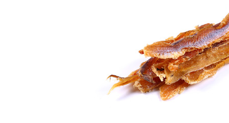 Alaska pollock fillet with pepper on a white background (isolated). Snack Fish to beer. Close up