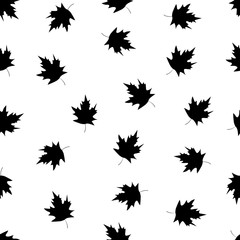 Seamless pattern with black maple leaves on the white background