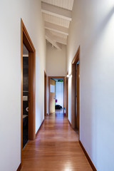 Corridor with doors, parquet floor