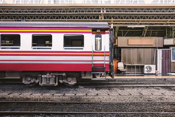 Fototapeta premium Side view of train bogies parking on at terminal at main central station for maintenance services and departure