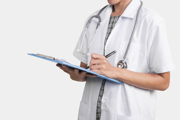 woman doctor hand holding prescription clipboard with copy space isolated on white background.