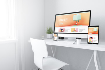  devices on white minimal workspace creativity website