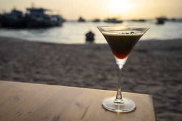 Cocktail at sunset beach