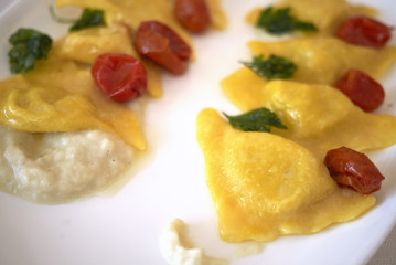 Ravioli pasta with roasted cherry tomatoes