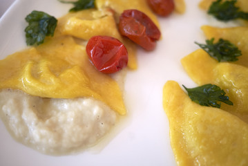 Ravioli pasta with roasted cherry tomatoes
