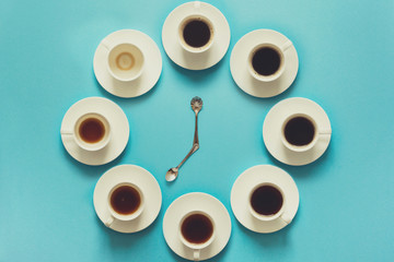 Overhead view of the steps in drinking a cup of fresh espresso. Coffee clock. Art food. Good morning concept. Toned