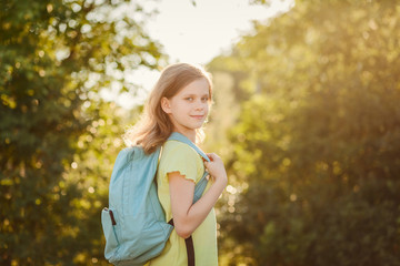 girl with a backpack on your back