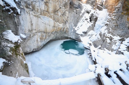 Frozen Lower Falls of Johnston Canyon During Winter in Alberta