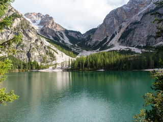 Fototapeta na wymiar Braies Lake. Colorful autumn landscape in Italian Alps, Naturpark Fanes-Sennes-Prags, Dolomite, Italy, Europe. Beauty of nature concept background. September, 2017