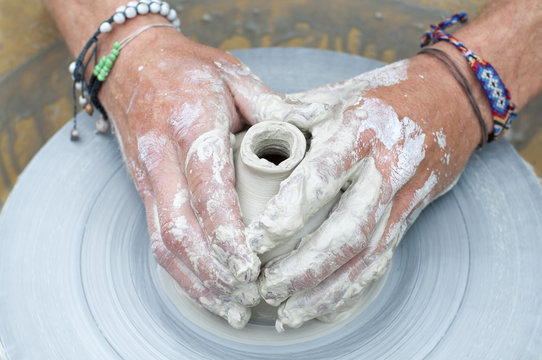 mains de potier