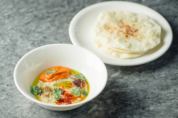 hummus with baked peppers and tortillas