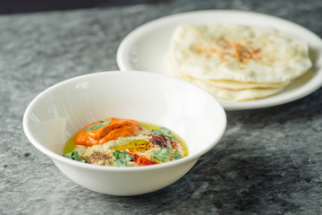hummus with baked peppers and tortillas