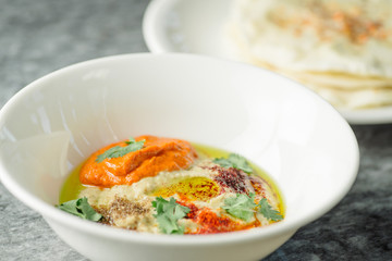 hummus with baked peppers and tortillas