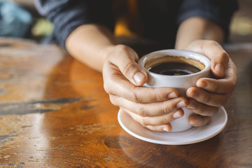 Fototapeta na wymiar Coffee cup in hand woman.
