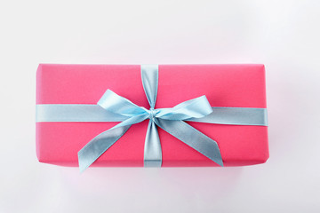 Beautiful gift box with ribbon on white background