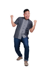 Happy Young Man Shows Winning Gesture