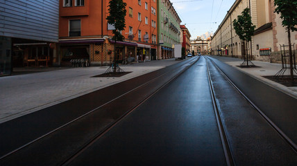 View of Triumphal Arch (German: Triumphpforte) from Maria-Theresien strasse (Maria Theresa Street) in old town Innsbruck, Tyrol, Austria, Europe