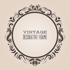 Round vintage ornate border frame, victorian and royal baroque style decorative design. Elegant frame shape with hearts and swirls for labels, wedding and party invitations. Vector illustration.