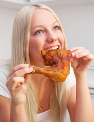  woman eating fried chicken
