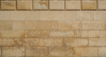 Stone wall texture for design. Part of the wall of the ancient castle as a texture.