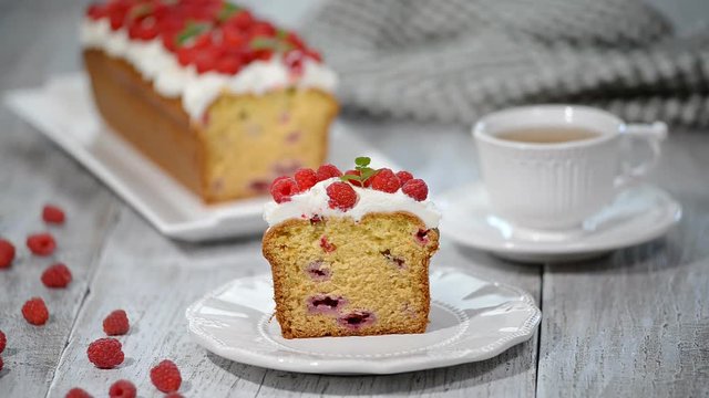Cake with raspberries and mint leaves