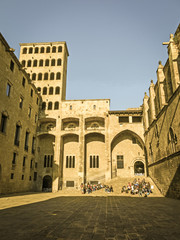 Fototapeta na wymiar Barcelona: medieval Palau Reial (Royal Palace in catalan) at Placa del Rei (King's Square). Barcelona, Spain