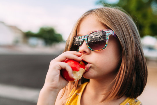 Close-up of Girl Eating Apple