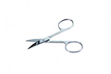 Manicure scissors on a white background close up view
