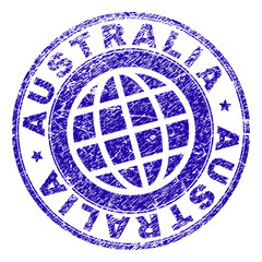 AUSTRALIA stamp imprint with grunge texture. Blue vector rubber seal imprint of AUSTRALIA text with unclean texture. Seal has words arranged by circle and planet symbol.
