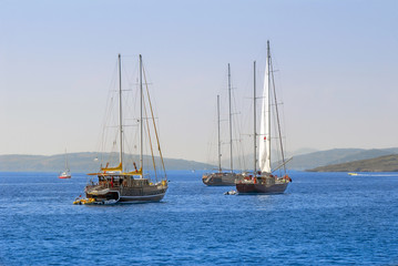 Fototapeta premium Bodrum, Turkey, 25 October 2010: Gulet Wooden Sailboats at Cove of Kumbahce