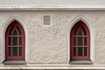 Red windows of  an old church in Finland