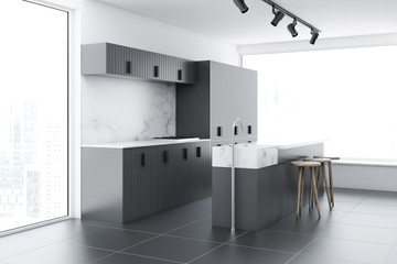 Gray loft kitchen corner with a bar